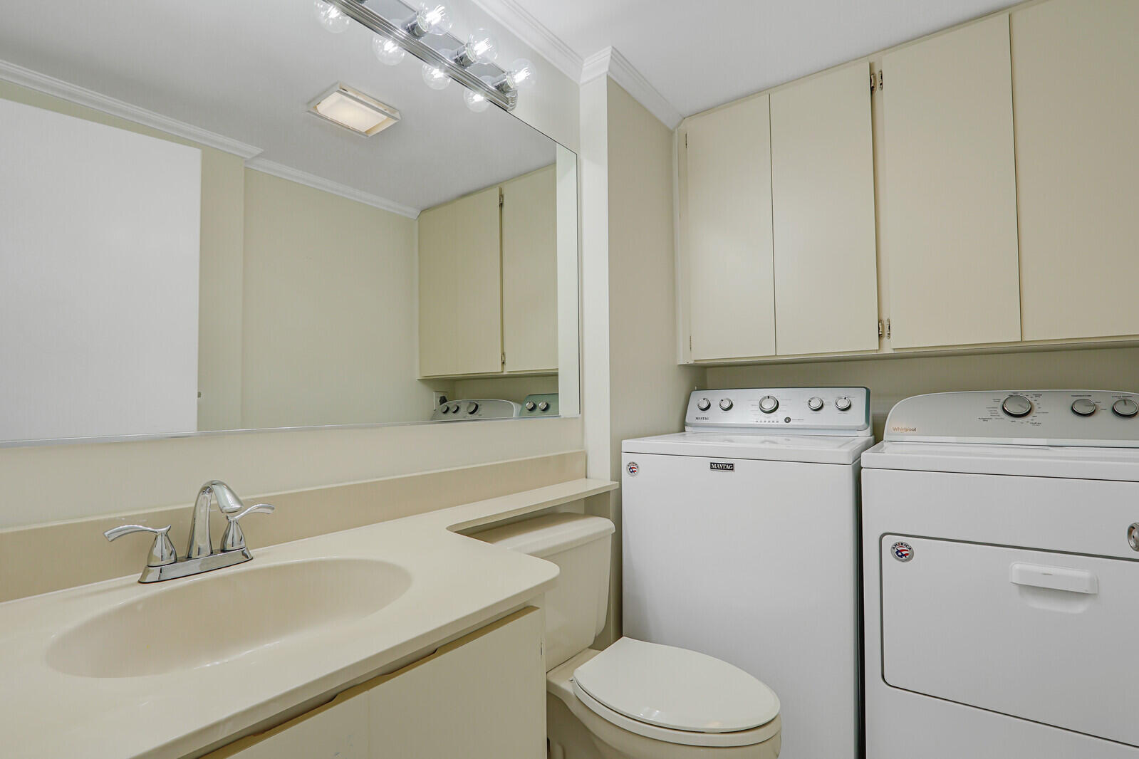 3026 30th Court Jupiter, FL 33477 - Photo 7 of 15 a view of bathroom with a sink a toilet and vanity