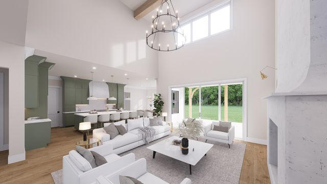 a living room with furniture chandelier and a large window