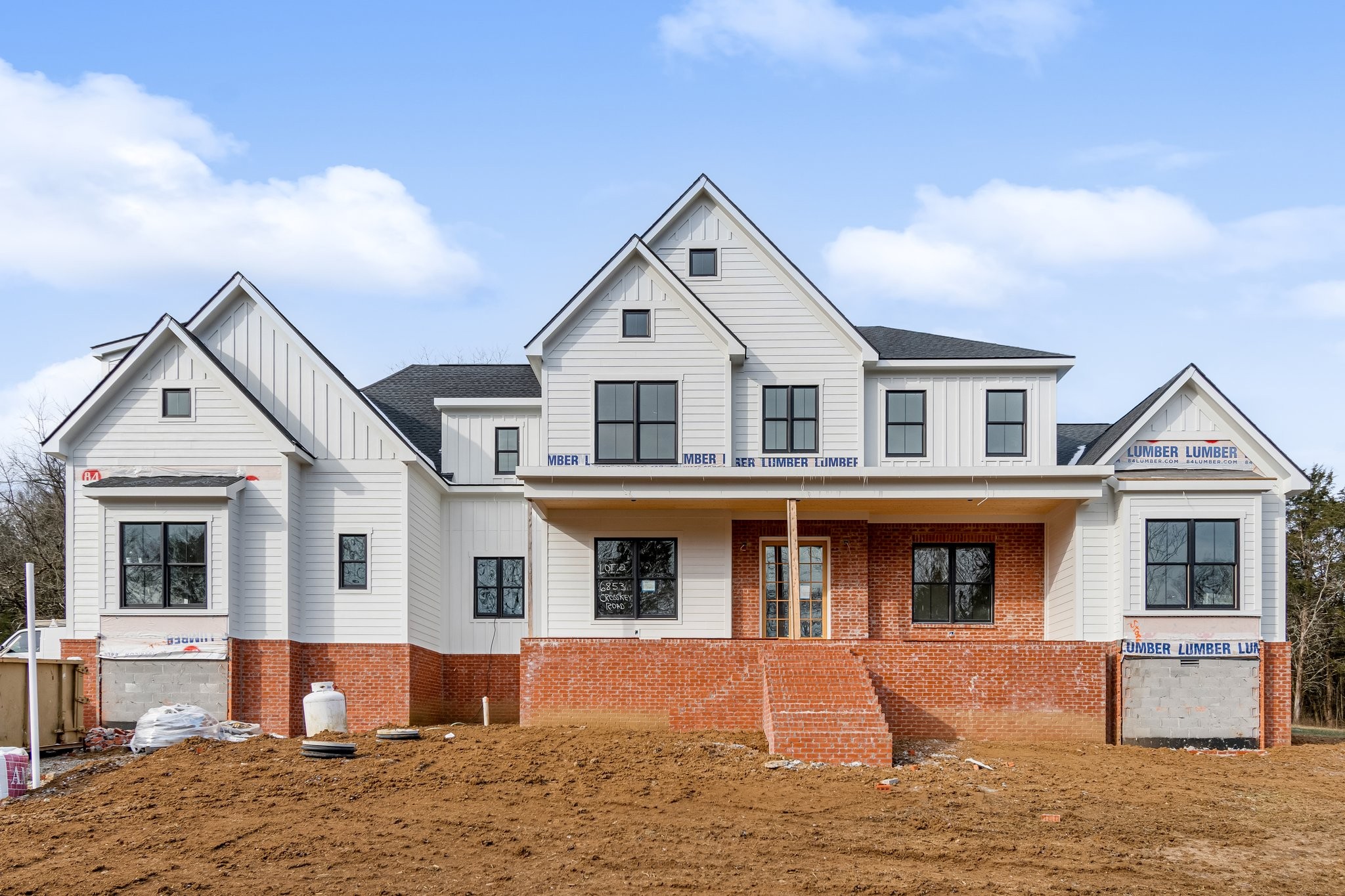 6853 Cross Keys Road College Grove, TN 37046 - Photo 2 of 74 a front view of a house with a yard