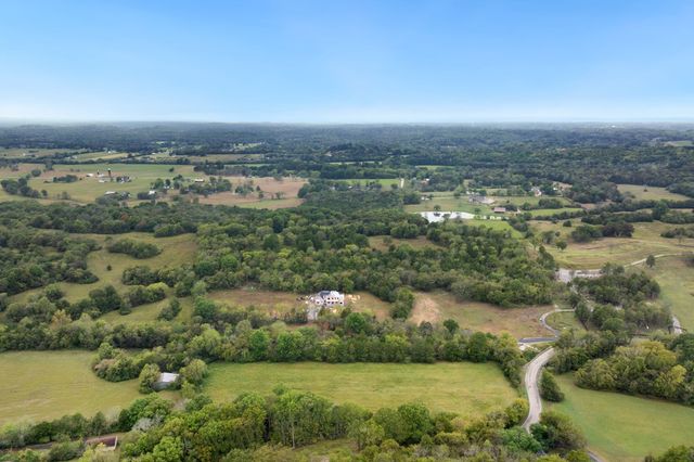 a view of a city with a mountain in the background