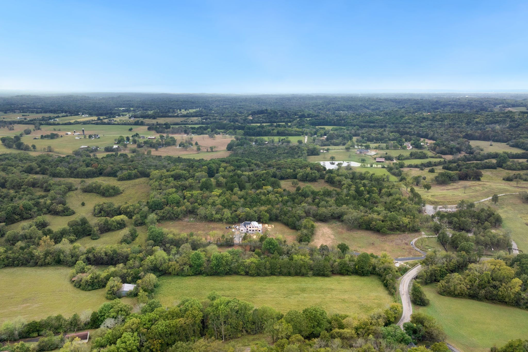 6853 Cross Keys Road College Grove, TN 37046 - Photo 36 of 74 an aerial view of residential houses with outdoor space and trees