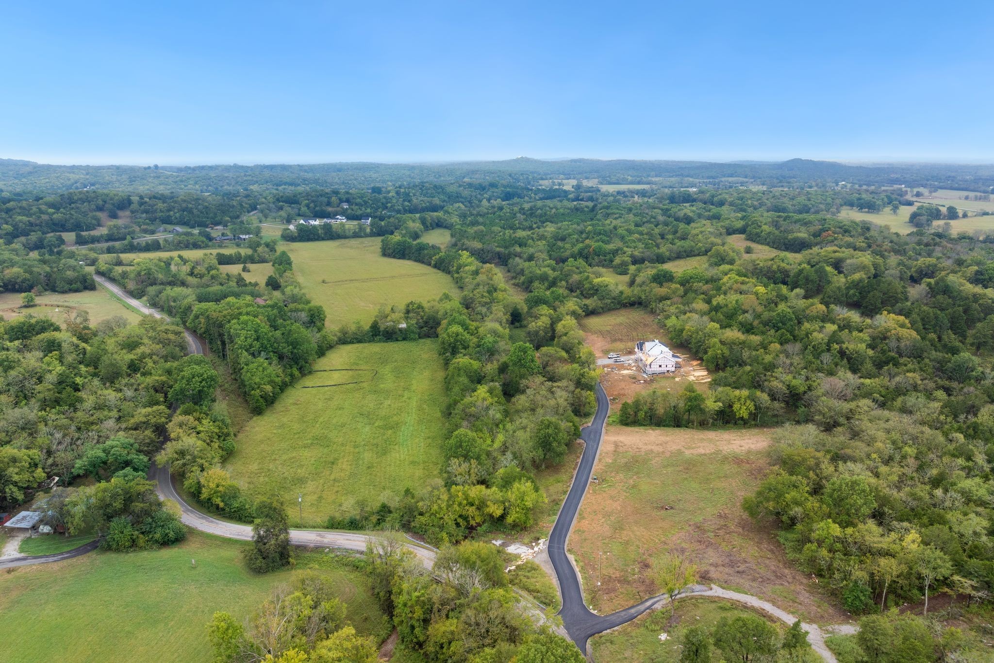6853 Cross Keys Road College Grove, TN 37046 - Photo 48 of 74 an aerial view of residential houses with outdoor space and trees