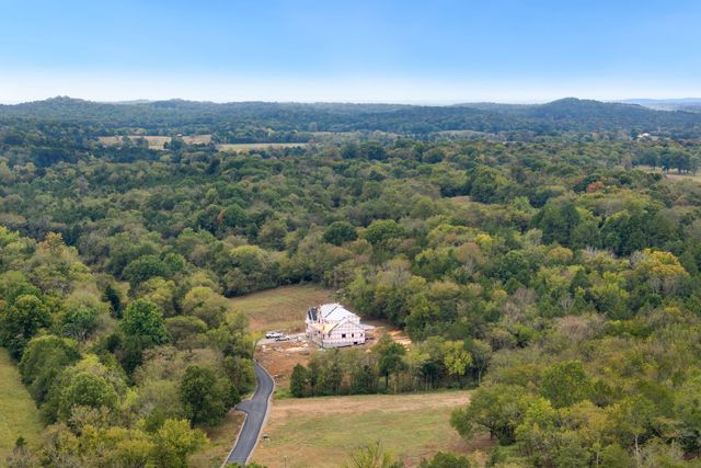 a view of a town with mountains in the background