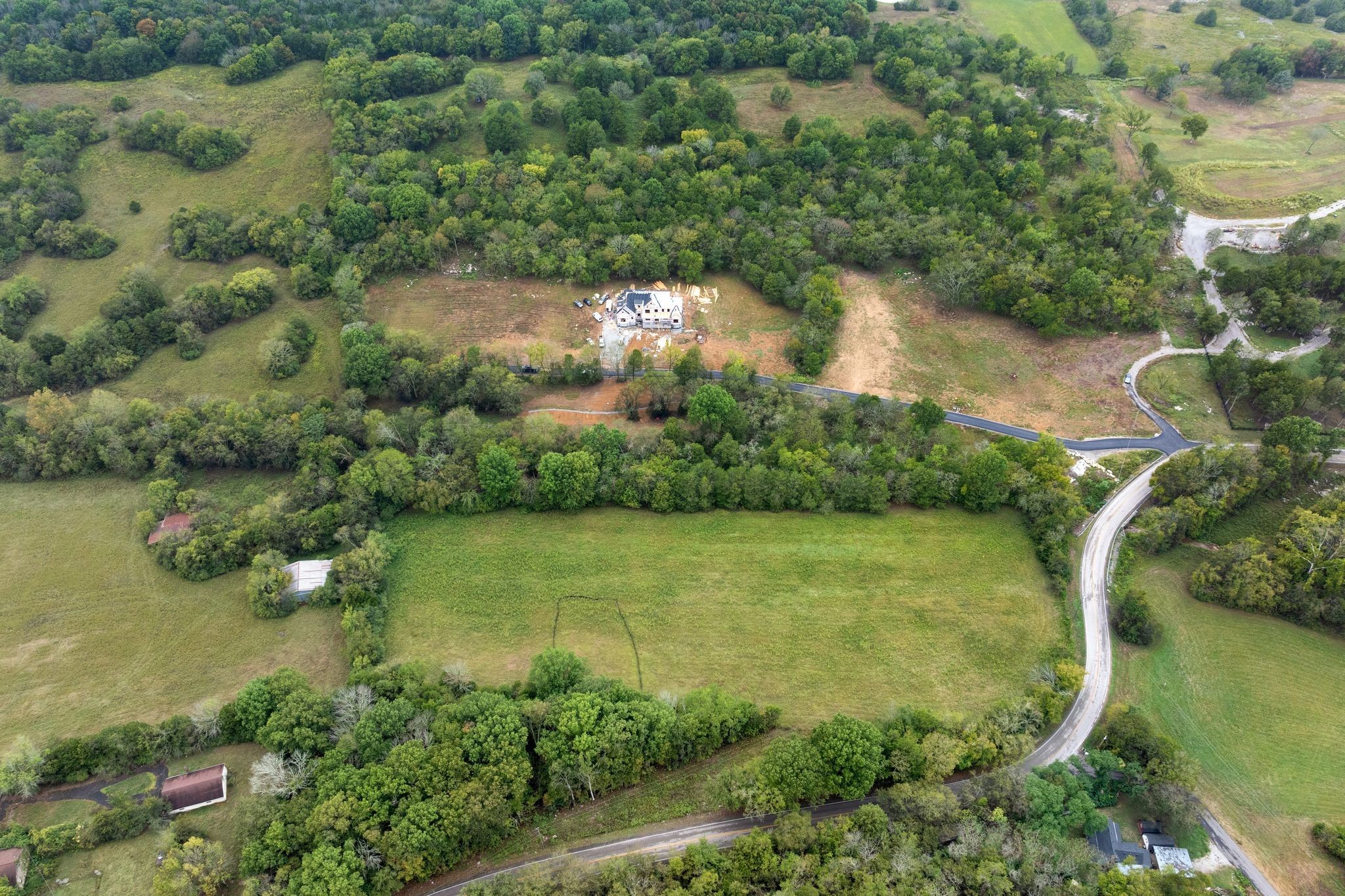6853 Cross Keys Road College Grove, TN 37046 - Photo 50 of 74 an aerial view of a residential houses with outdoor space and trees all around