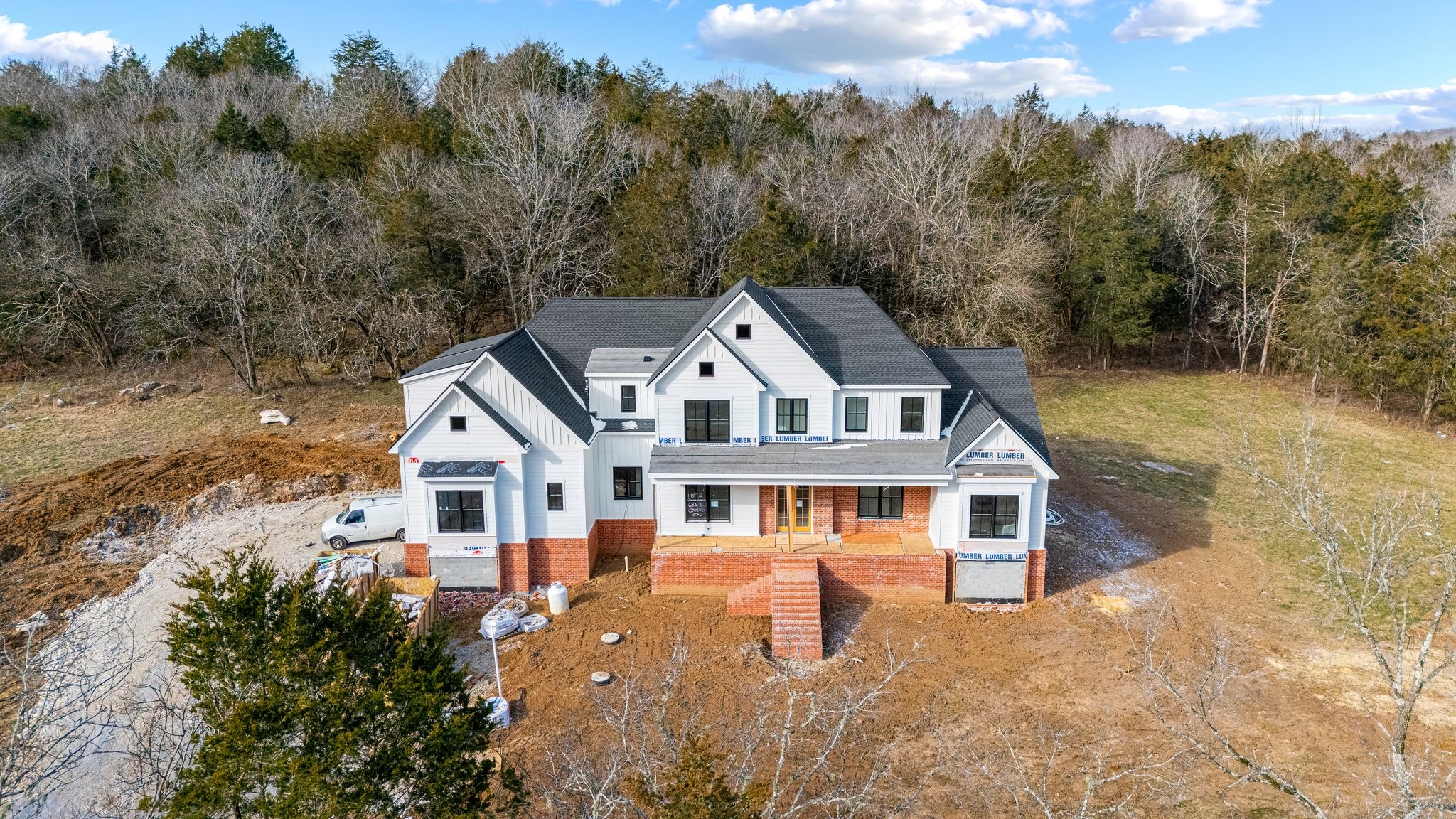 6853 Cross Keys Road College Grove, TN 37046 - Photo 63 of 74 a front view of a house with a yard and mountain view in back