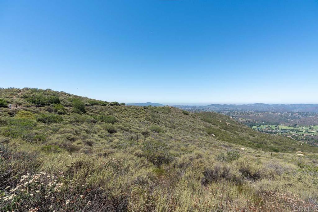 18055 Sunset Point Poway, CA 92064 - Photo 31 of 39 a view of a large mountain with mountains in the background