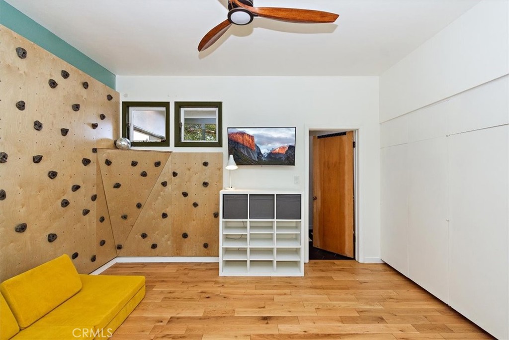 3052 Panorama Road Riverside, CA 92506 - Photo 35 of 53 a view of an empty room with wooden floor and a window