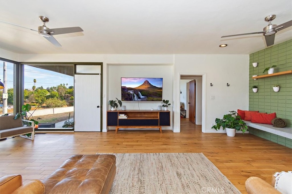 3052 Panorama Road Riverside, CA 92506 - Photo 9 of 53 a living room with furniture and a flat screen tv