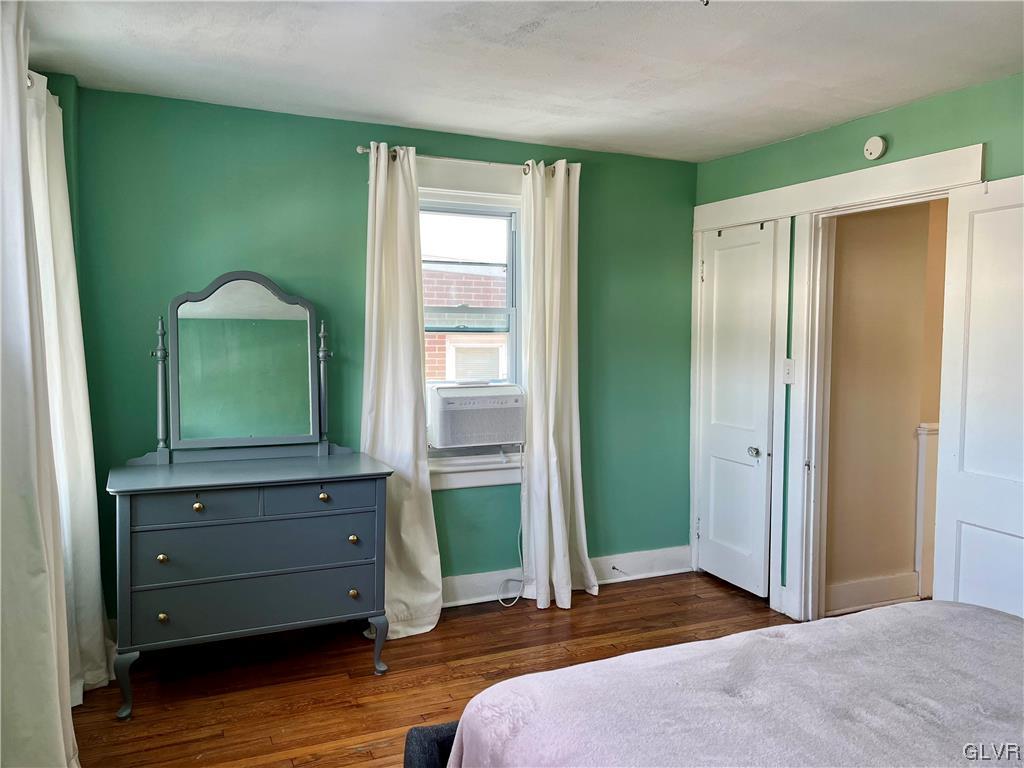 715 Spring Street Bethlehem, PA 18018 - Photo 13 of 28 a bedroom with a bed and a window