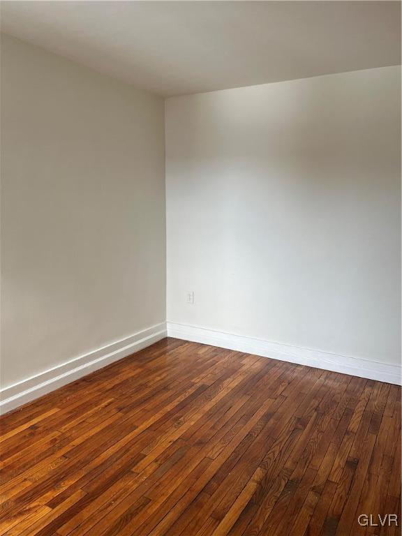 715 Spring Street Bethlehem, PA 18018 - Photo 18 of 28 a view of an empty room with wooden floor