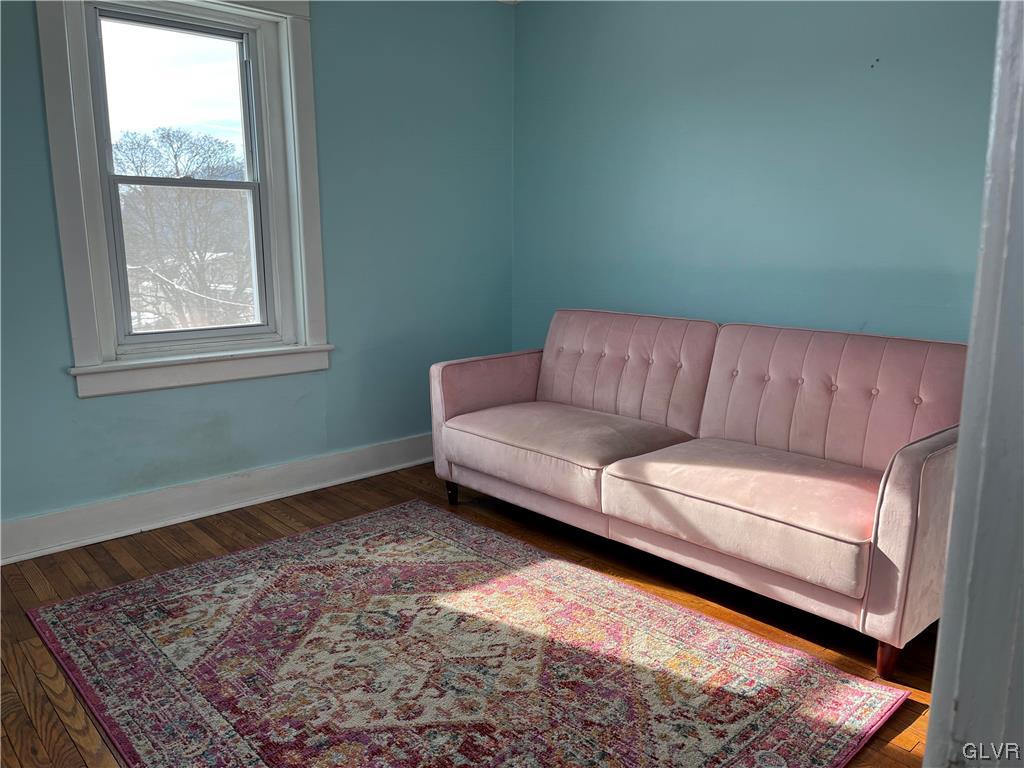 715 Spring Street Bethlehem, PA 18018 - Photo 21 of 28 a living room with furniture and a rug