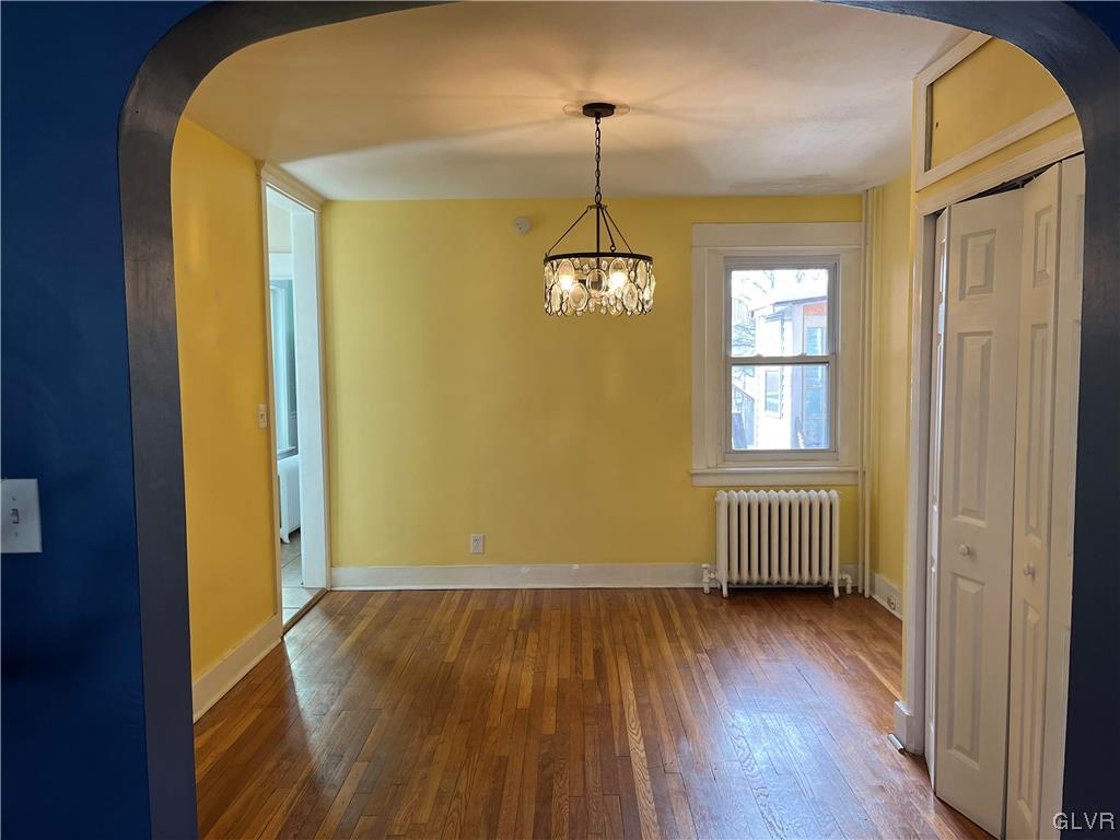 715 Spring Street Bethlehem, PA 18018 - Photo 5 of 28 a view of empty room with wooden floor and fan