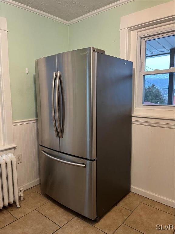 715 Spring Street Bethlehem, PA 18018 - Photo 10 of 28 a metallic refrigerator freezer sitting in a kitchen