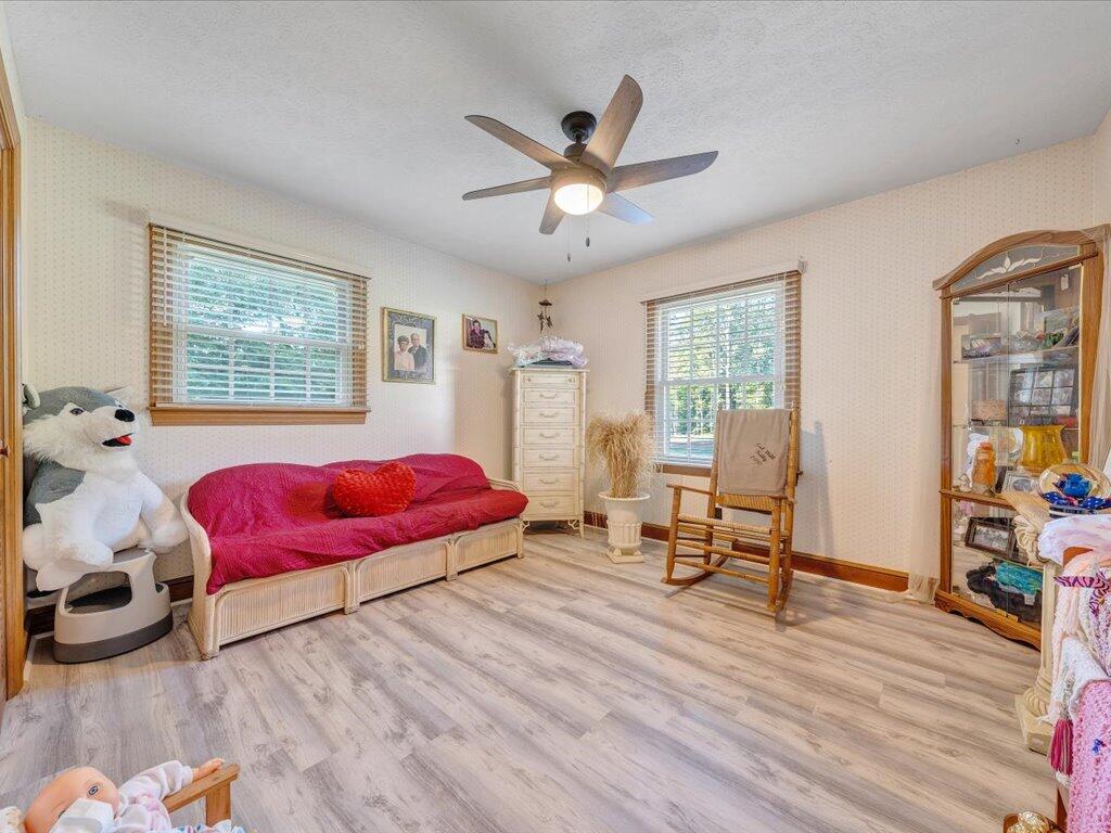 525 Mulberry Road Ridgeway, VA 24148 - Photo 28 of 55 a living room with furniture and a wooden floor