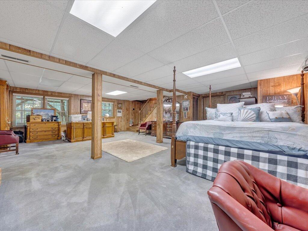 525 Mulberry Road Ridgeway, VA 24148 - Photo 33 of 55 a living room with furniture gym equipment and a large window