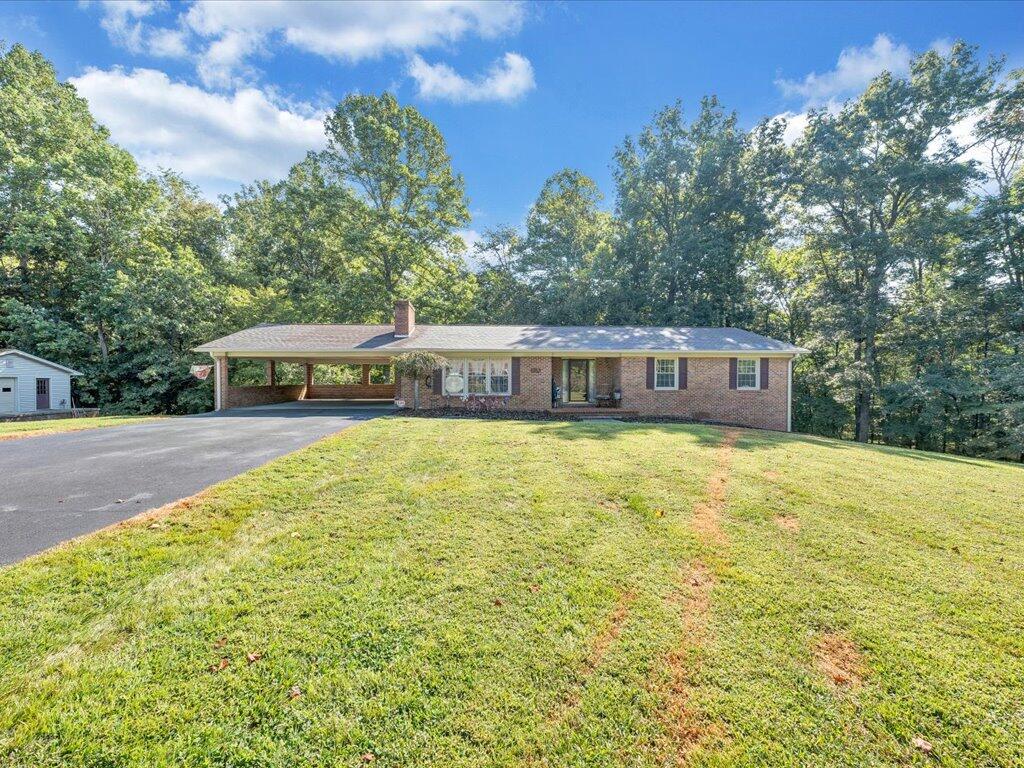 525 Mulberry Road Ridgeway, VA 24148 - Photo 45 of 55 a front view of a house with a yard