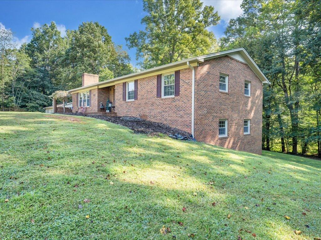 525 Mulberry Road Ridgeway, VA 24148 - Photo 47 of 55 a front view of a house with a yard