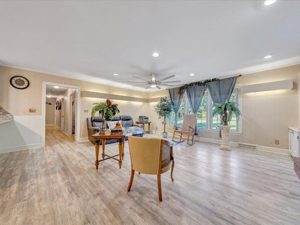 525 Mulberry Road Ridgeway, VA 24148 - Photo 6 of 55 a living room with furniture and a wooden floor