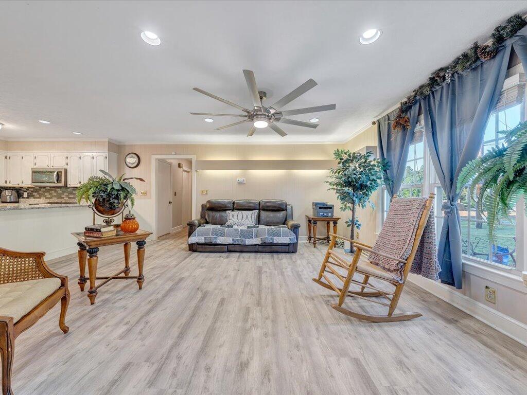525 Mulberry Road Ridgeway, VA 24148 - Photo 8 of 55 a living room with furniture and a large window