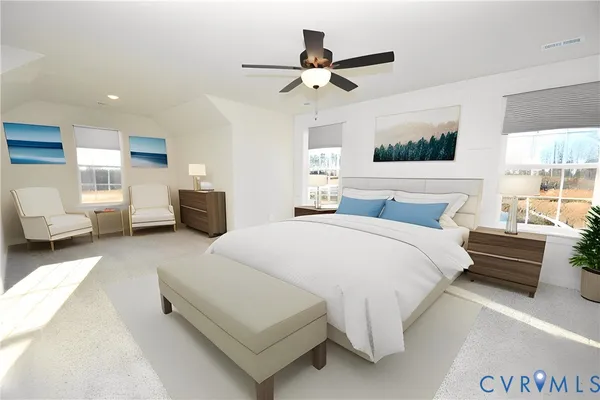 a spacious bedroom with a bed a couch and a window