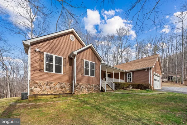 a view of swimming pool with a lounge chair