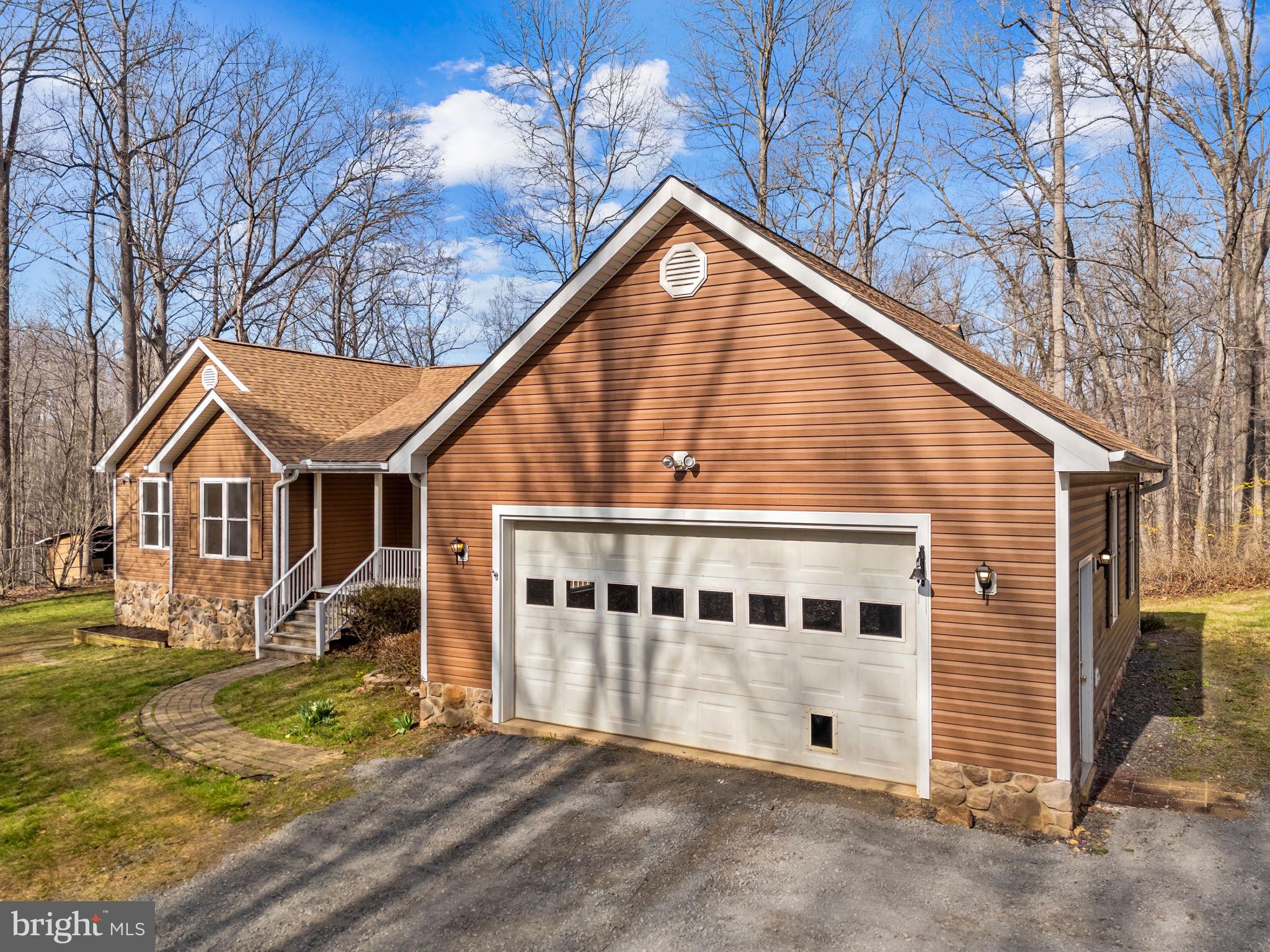 584 South Poes Road Amissville, VA 20106 - Photo 18 of 82 a view of house with yard and sitting area