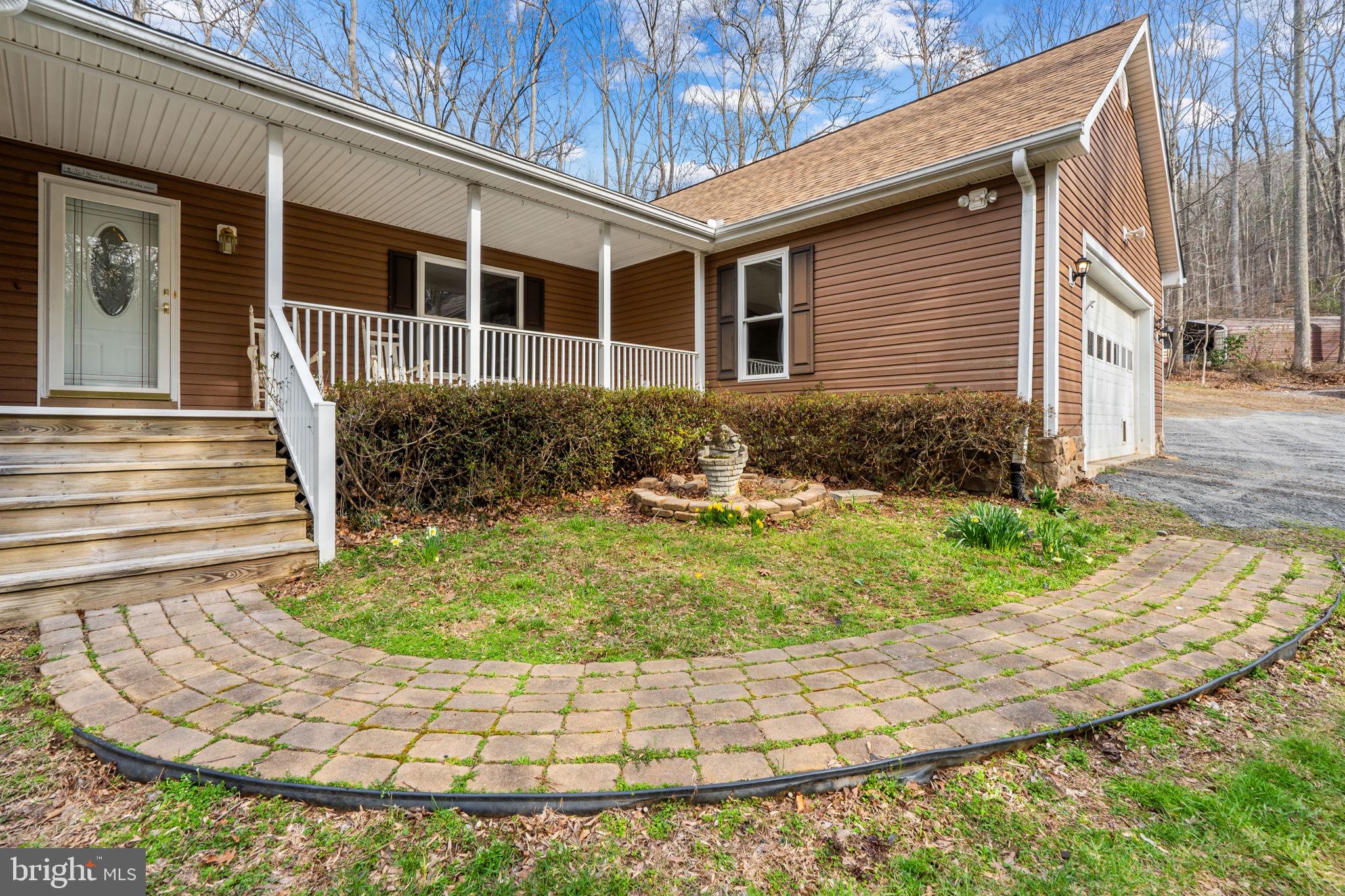 584 South Poes Road Amissville, VA 20106 - Photo 20 of 82 a view of a house with backyard and garden