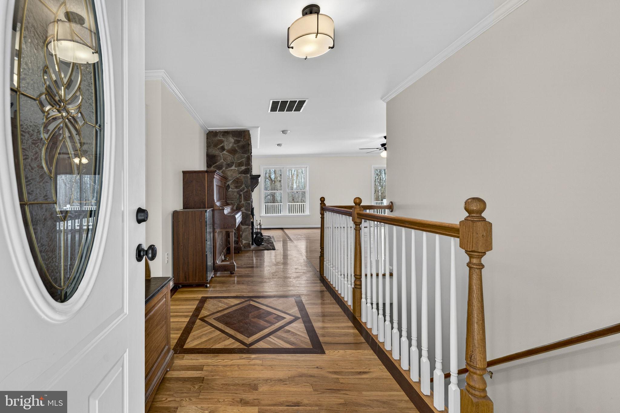 584 South Poes Road Amissville, VA 20106 - Photo 23 of 82 a view of a hallway with wooden floor