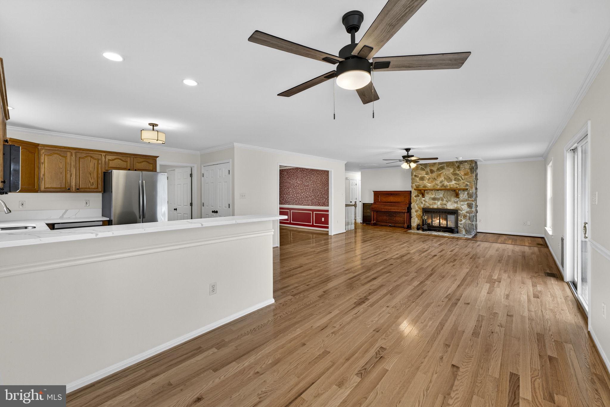 584 South Poes Road Amissville, VA 20106 - Photo 35 of 82 a view of a livingroom with furniture and a ceiling fan