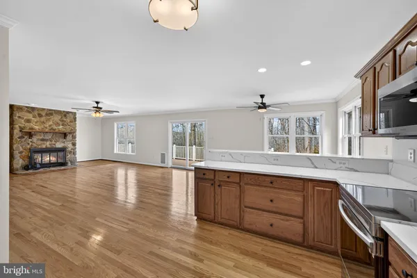 a view of empty room with wooden ceiling