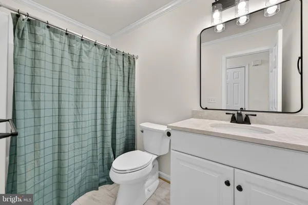 a view of a storage & utility room with a sink