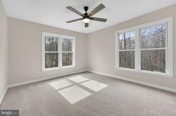 a view of a house with a large window
