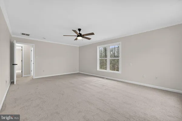 a view of a backyard of the house