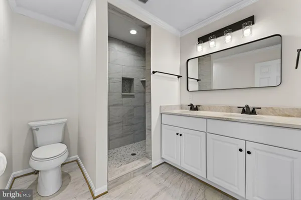 a view of a cars park in front of house