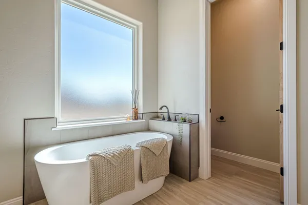 a view of house with a yard