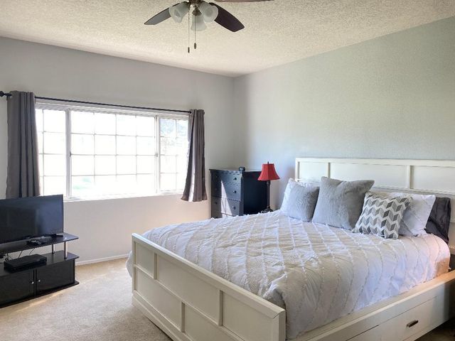 a bathroom with a sink double vanity and a mirror