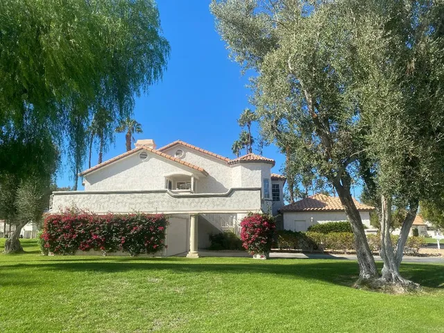 a front view of a white and a white house