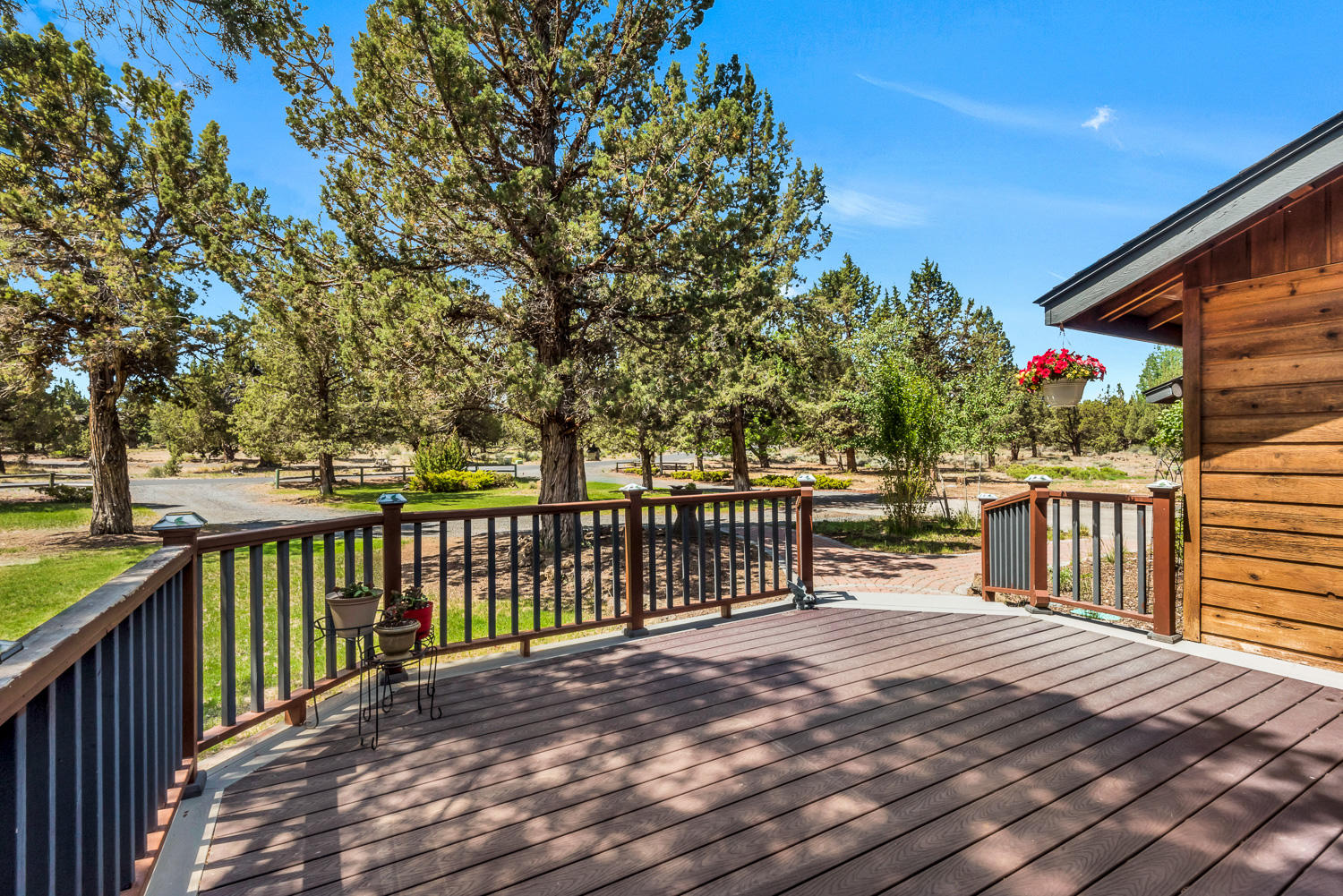 64736 Sylvan Loop Bend, OR 97701 - Photo 6 of 46 a balcony with wooden floor and fence