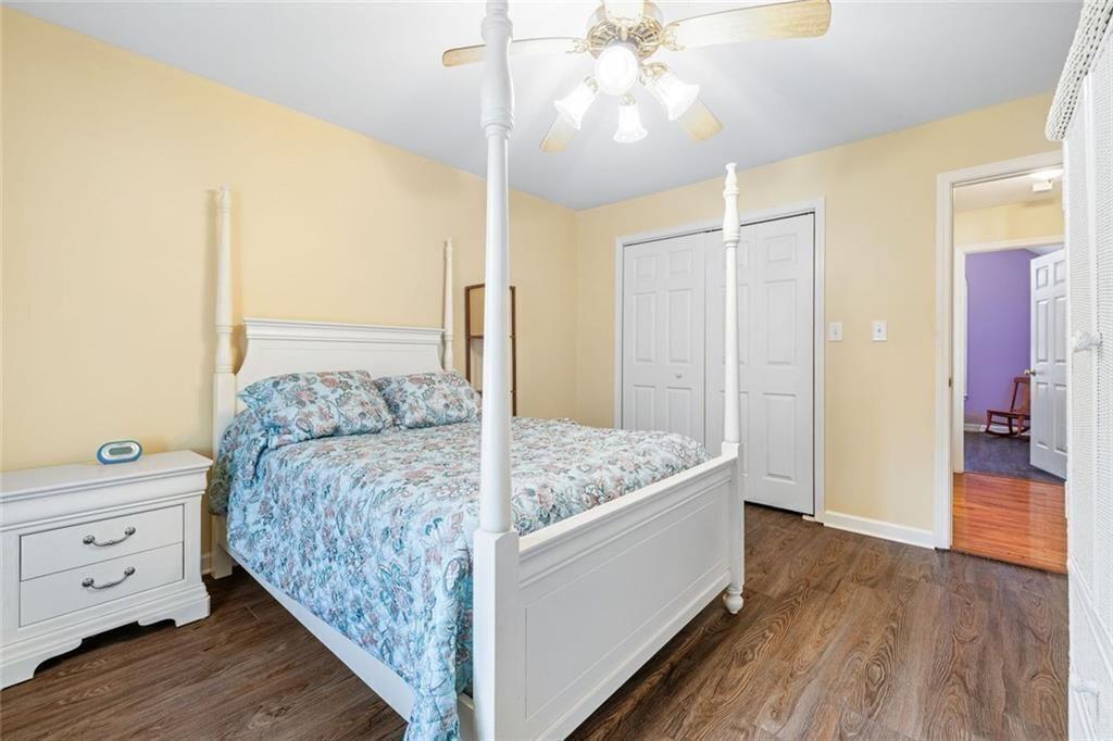 4609 Hunters Court Gainesville, GA 30507 - Photo 23 of 46 a living room with bed and ceiling fan
