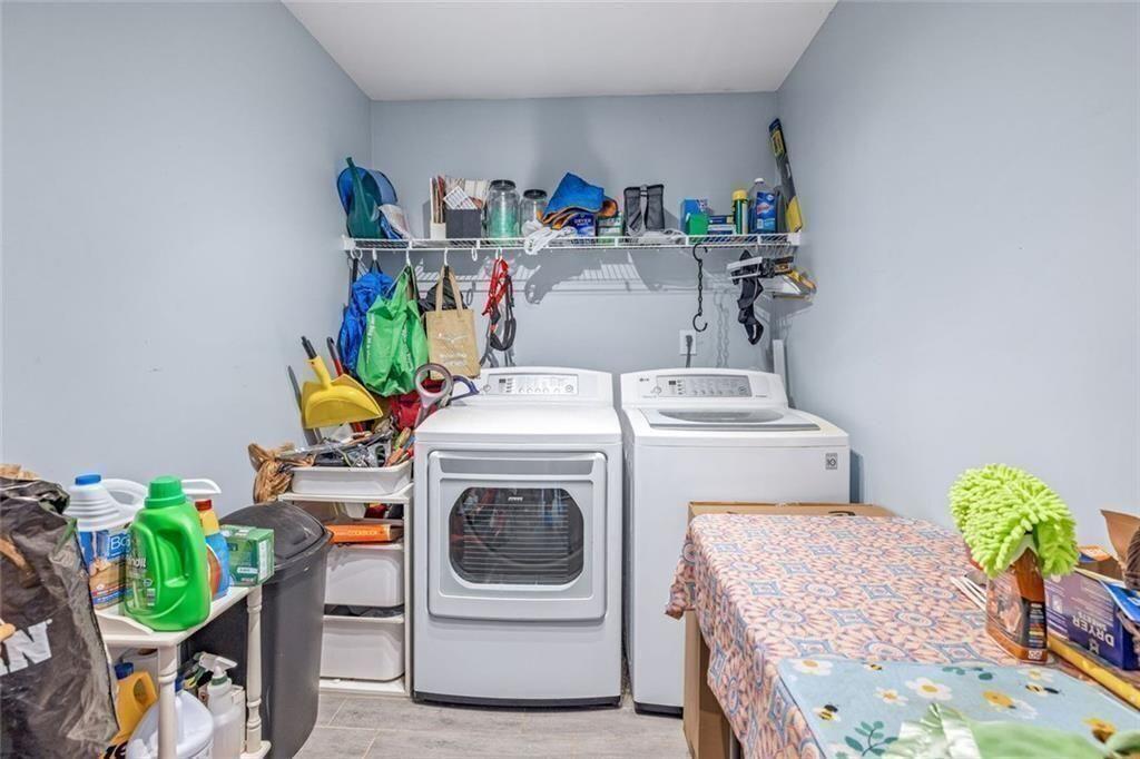 4609 Hunters Court Gainesville, GA 30507 - Photo 27 of 46 a utility room with dryer and washer