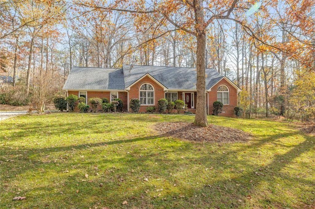 4609 Hunters Court Gainesville, GA 30507 - Photo 3 of 46 a front view of house with yard and green space