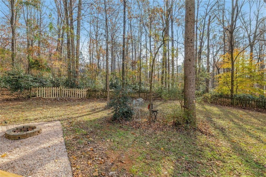 4609 Hunters Court Gainesville, GA 30507 - Photo 34 of 46 a view of a backyard with trees