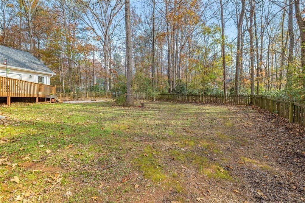 4609 Hunters Court Gainesville, GA 30507 - Photo 37 of 46 a view of a yard with a house