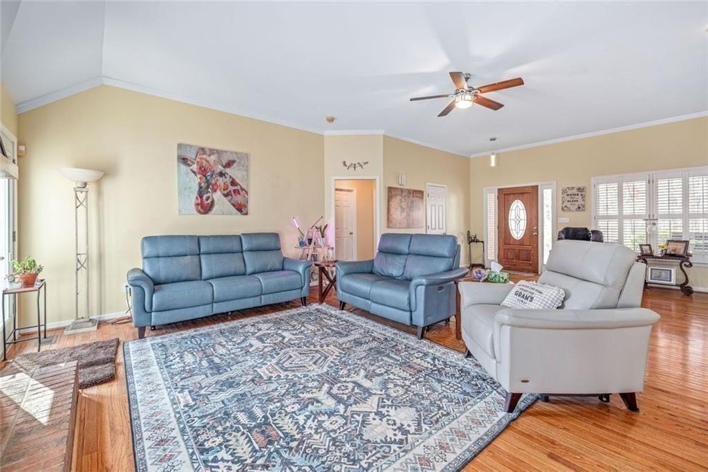 4609 Hunters Court Gainesville, GA 30507 - Photo 9 of 46 a living room with furniture and a rug