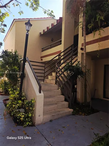 a view of entryway with a front door
