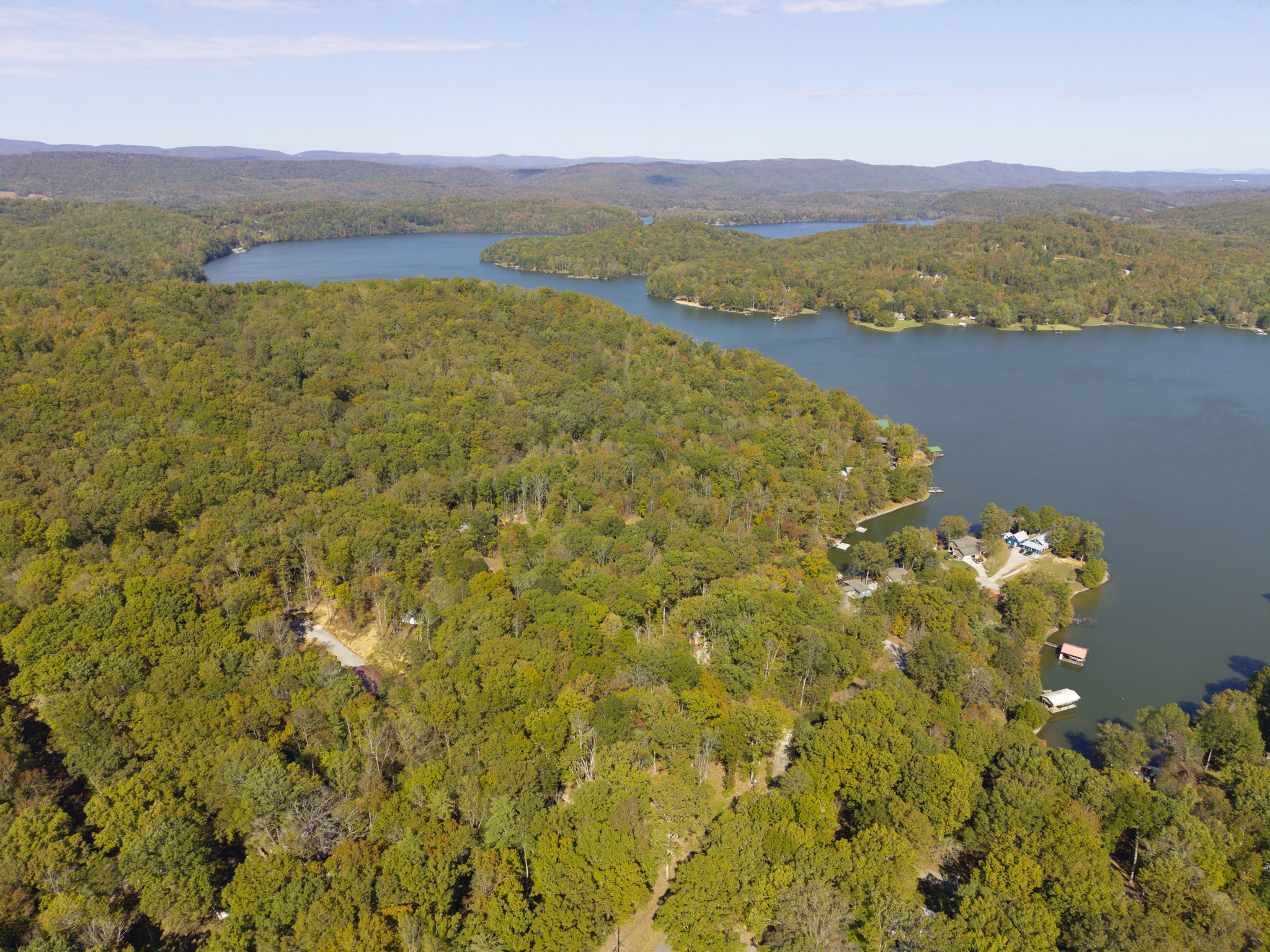 484 Apollo Drive Spring City, TN 37381 - Photo 18 of 18 a view of a lake with a mountain