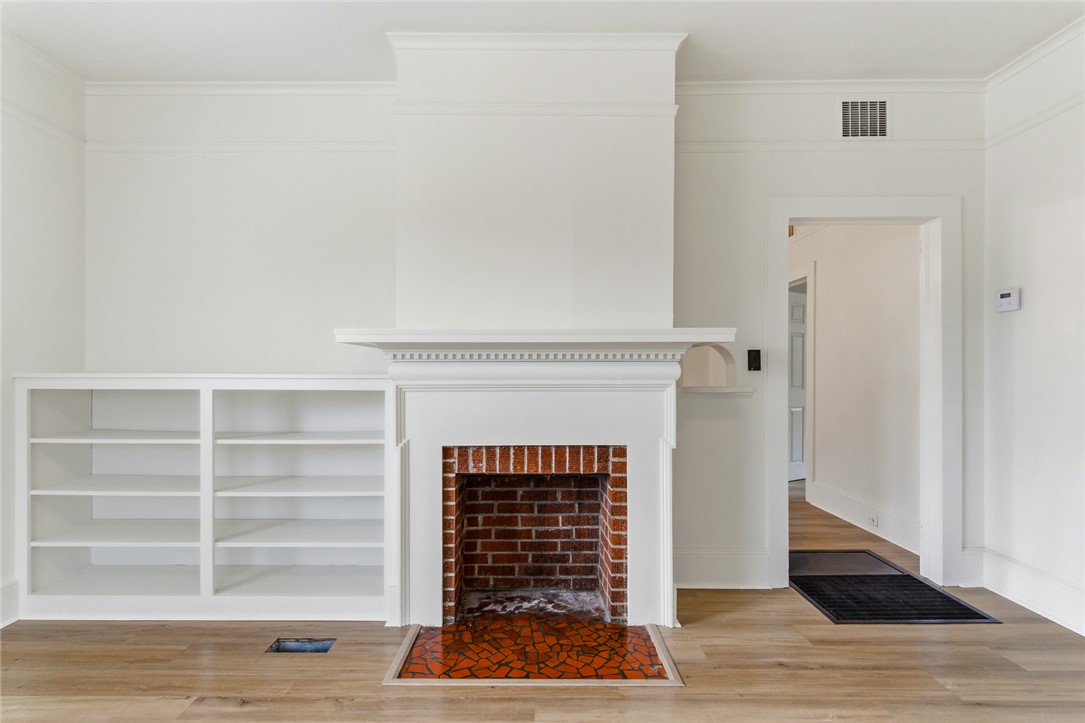 404 South Gossett Street Anderson, SC 29624 - Photo 7 of 50 Fireplace and shelving for books, games, or knick-knacks!