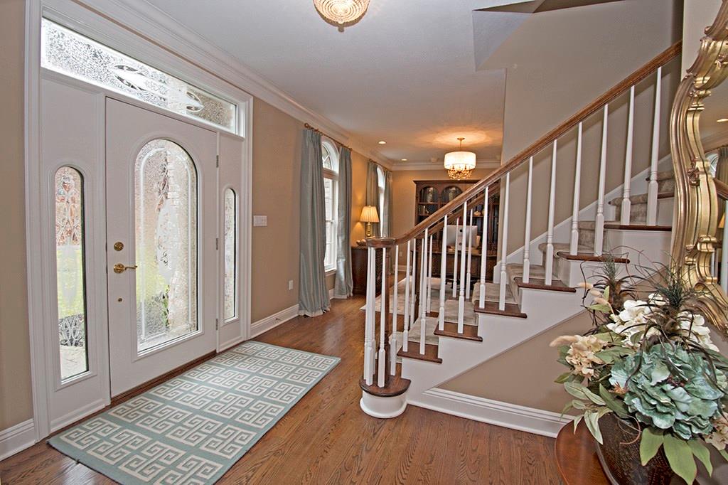 As you enter the home the formal Living Room/Office is on your left and Dining Room on your right.