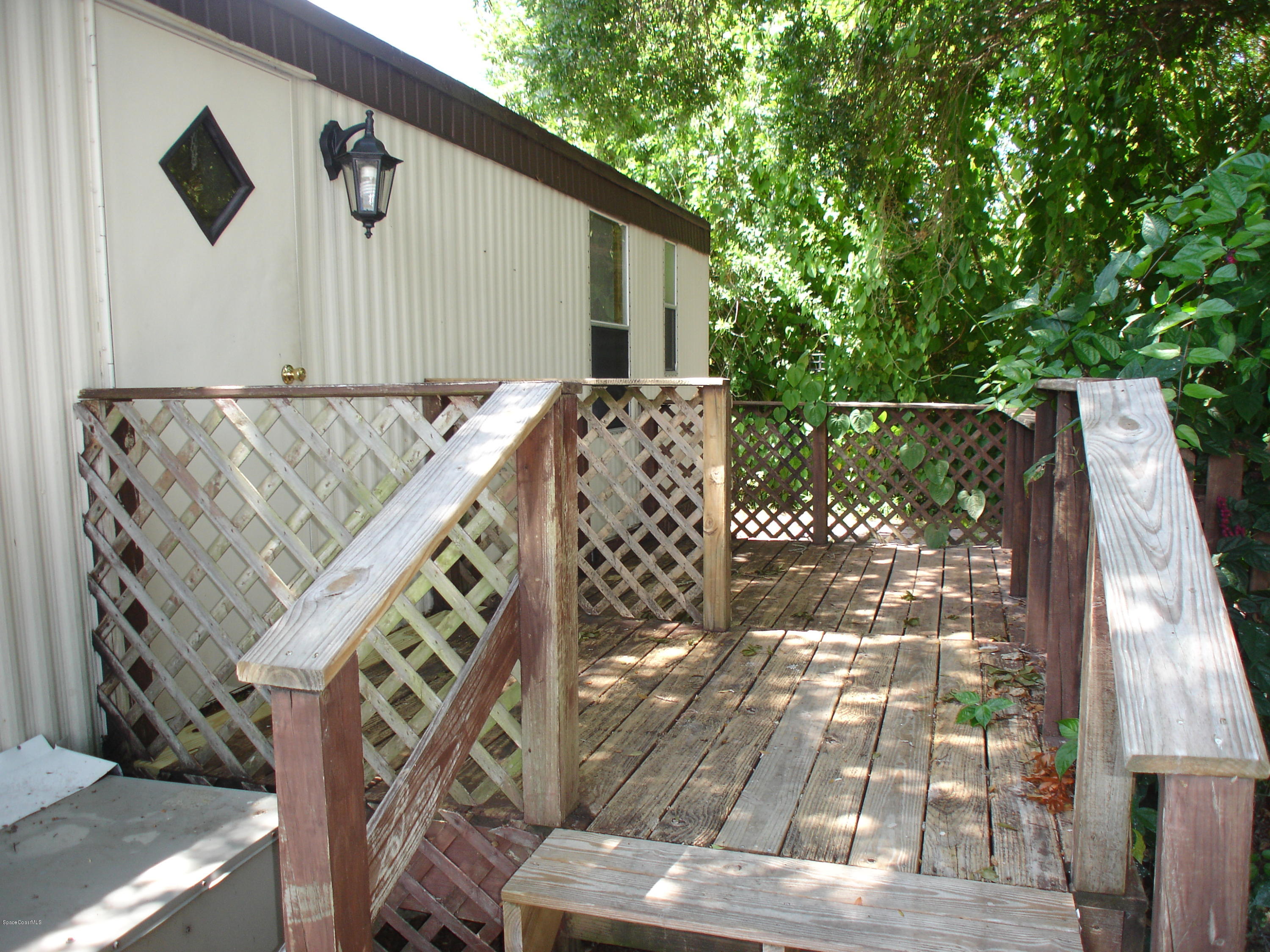 2553 Amberly Road Northeast Palm Bay, FL 32905 - Photo 3 of 26 PATIO DECK