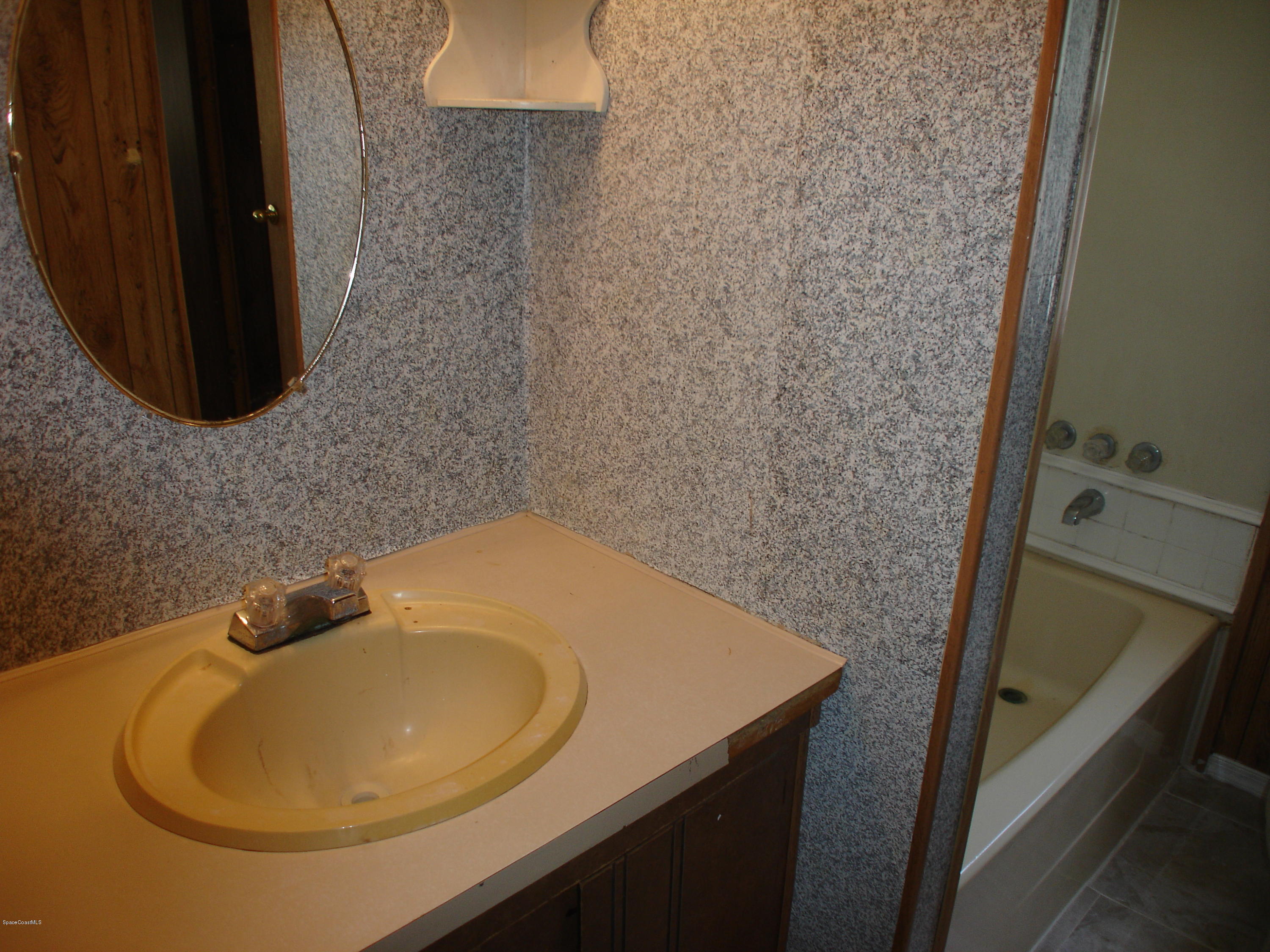 2553 Amberly Road Northeast Palm Bay, FL 32905 - Photo 8 of 26 BATH 1 SINGLE VANITY